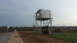 Score Tower destroyed above absent grandstands